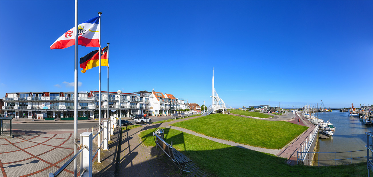 Foto aus der Fotogruppe Ansichten von der Dorfmitte, vom Sielwerk und vom Deich aus